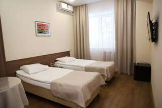 Гостиница Аквамарин Клин  Стандартный двухместный номер с 2 отдельными кроватями-1